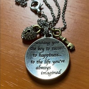 Fossil necklace that says